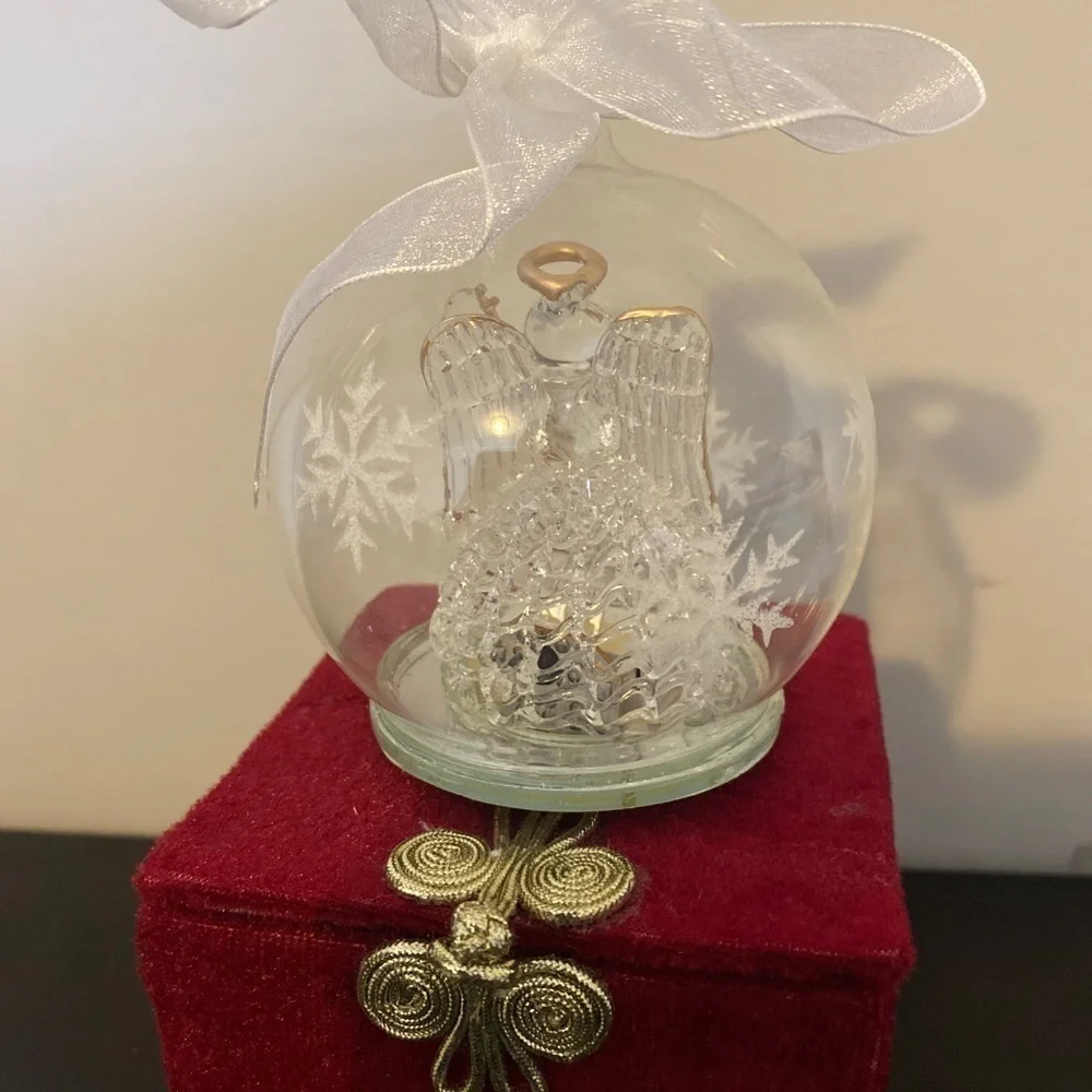Beautiful Glass angel ornament that lights up.
